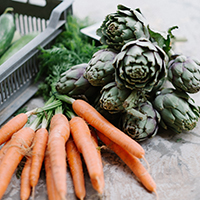 "image of fresh carrots and artichokes