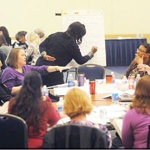 Staff conducting a working session.