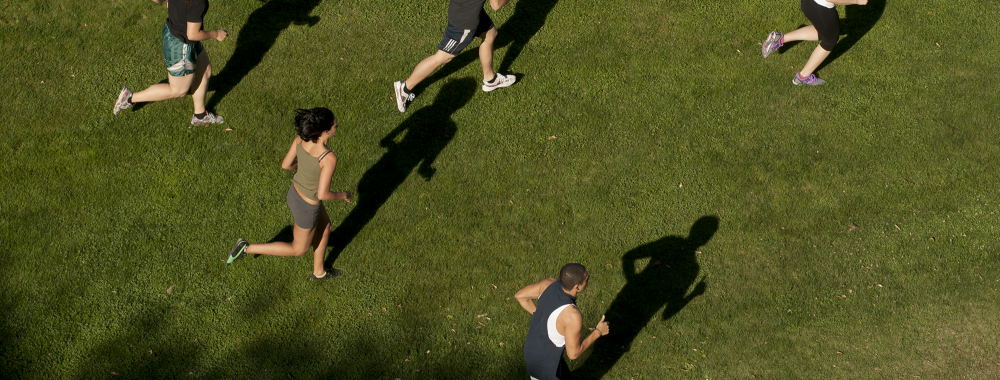 overhead shot of people running