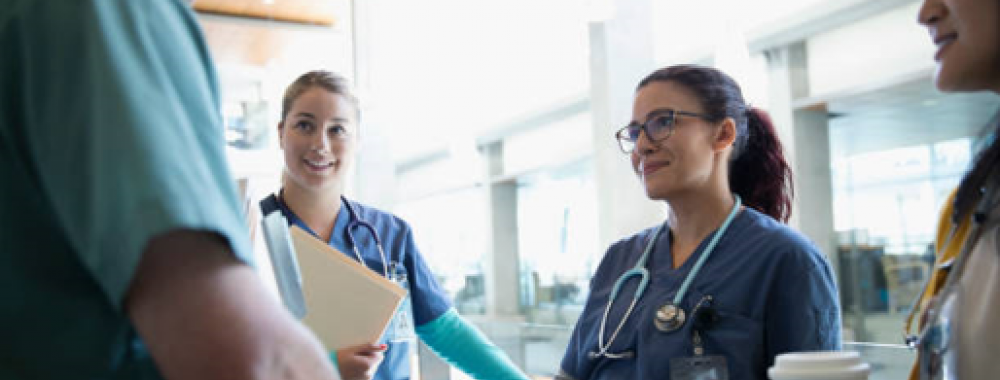 group of nurses having a conversation