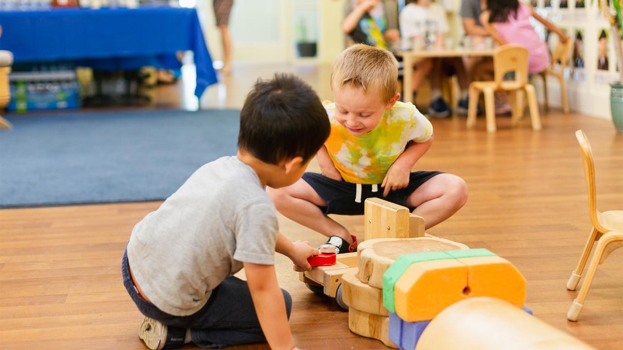 two young boys playing together at the uc davis hutchison child development center 10th anniversary celebrations