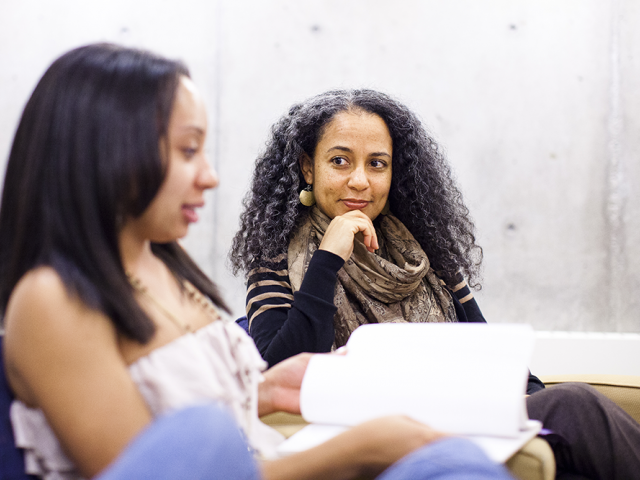 older woman listening while a younger woman speaks