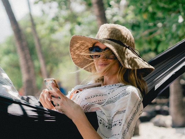 woman relaxing on a hammock