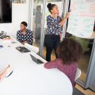 group of women working in a conference room