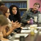 Group of people sitting in on a meeting.